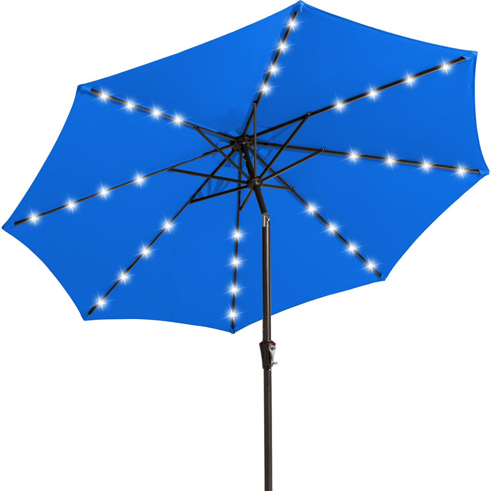 JEAREY 9ft umbrella with solar lights illuminating outdoor dining at dusk