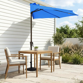 JEAREY half-wall umbrella placed against wall saves space on balcony.