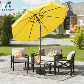 JEAREY yellow market umbrella in a garden setting.