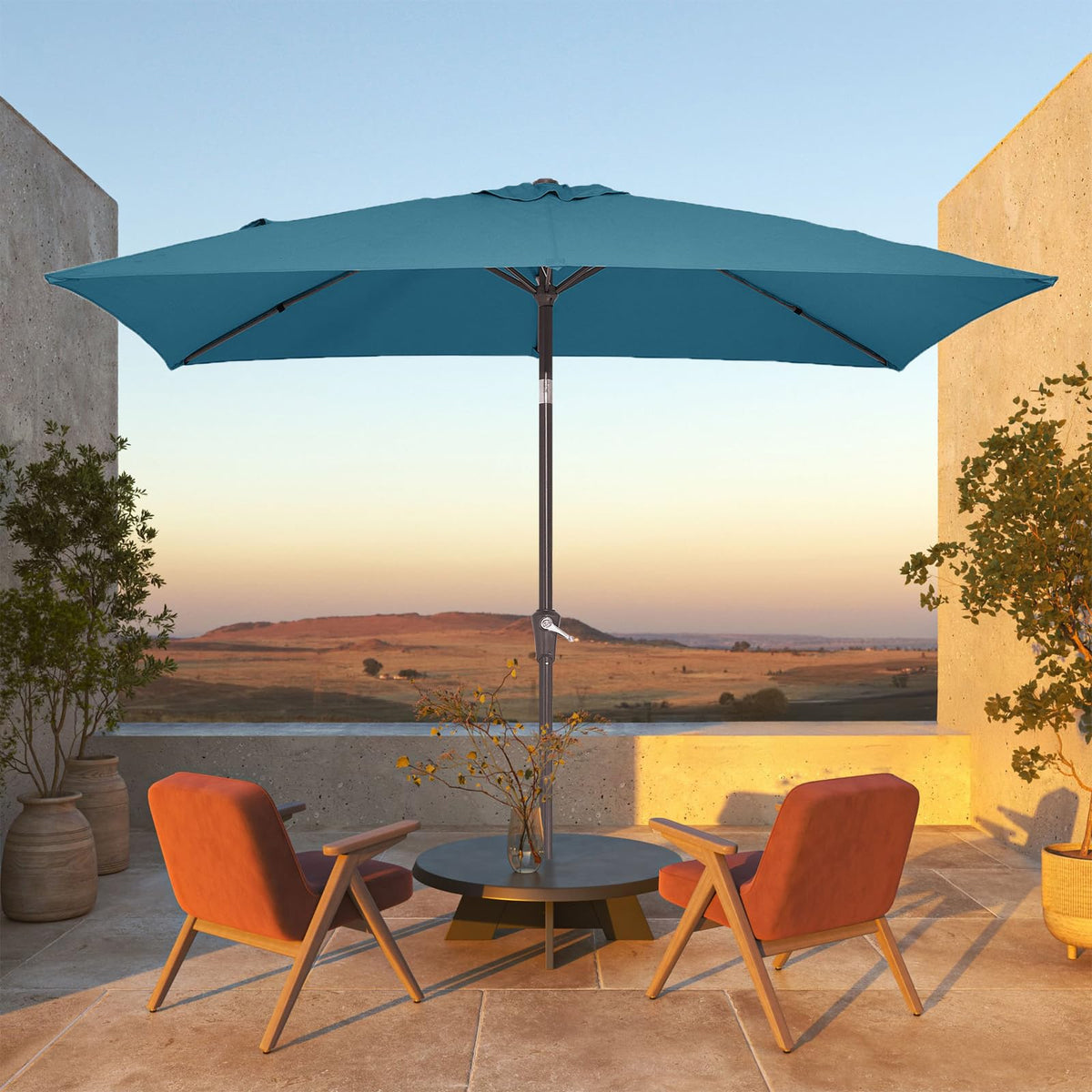 JEAREY wide shade 6.5x10 umbrella covers a table and chairs