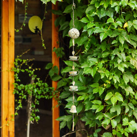 Jemeni green patina finish detail enhances outdoor decor and durability.