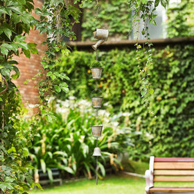 Jemeni installation-ready hanger simplifies setup on pergolas or trees.