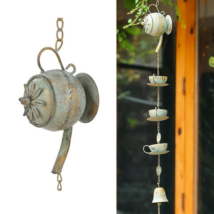 Jemeni teapot rain chime with green patina adds vintage charm to outdoor spaces.