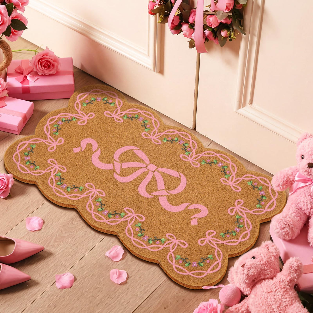 Jenaai pink bow coquette-style doormat closeup showing soft color and pattern.