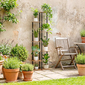 JEPRECO stand with greenery in a living room demonstrating decorative versatility