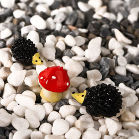 Jetec mini gnome with flower brightens indoor or outdoor displays.