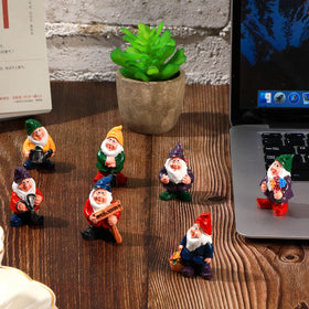 Jetec mini gnome with water can brightens shelves or desks with whimsy.