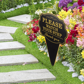 Jeyntanc Watch Your Step sign on driveway or patio guides visitors safely.