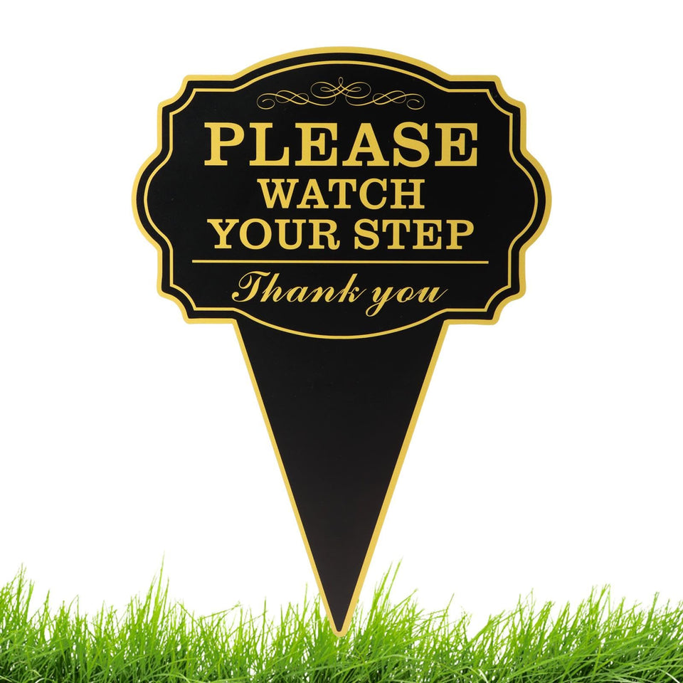 Jeyntanc Watch Your Step sign viewed from the front, clearly marking an outdoor safety reminder.