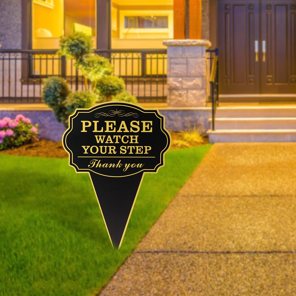 Jeyntanc Watch Your Step sign in garden-path setting improves safety awareness outdoors.