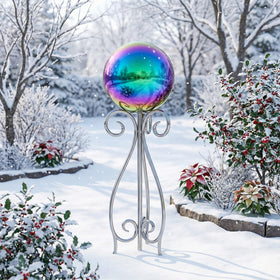 JforSJizT rainbow gazing ball on pedestal creates an elegant garden display.