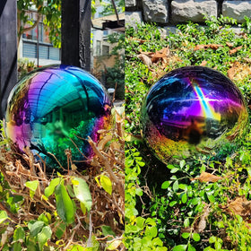 JforSJizT rainbow gazing ball on the patio boosts visual depth.