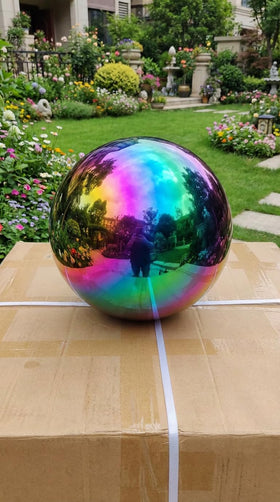 JforSJizT rainbow gazing ball captures surroundings for photography props.