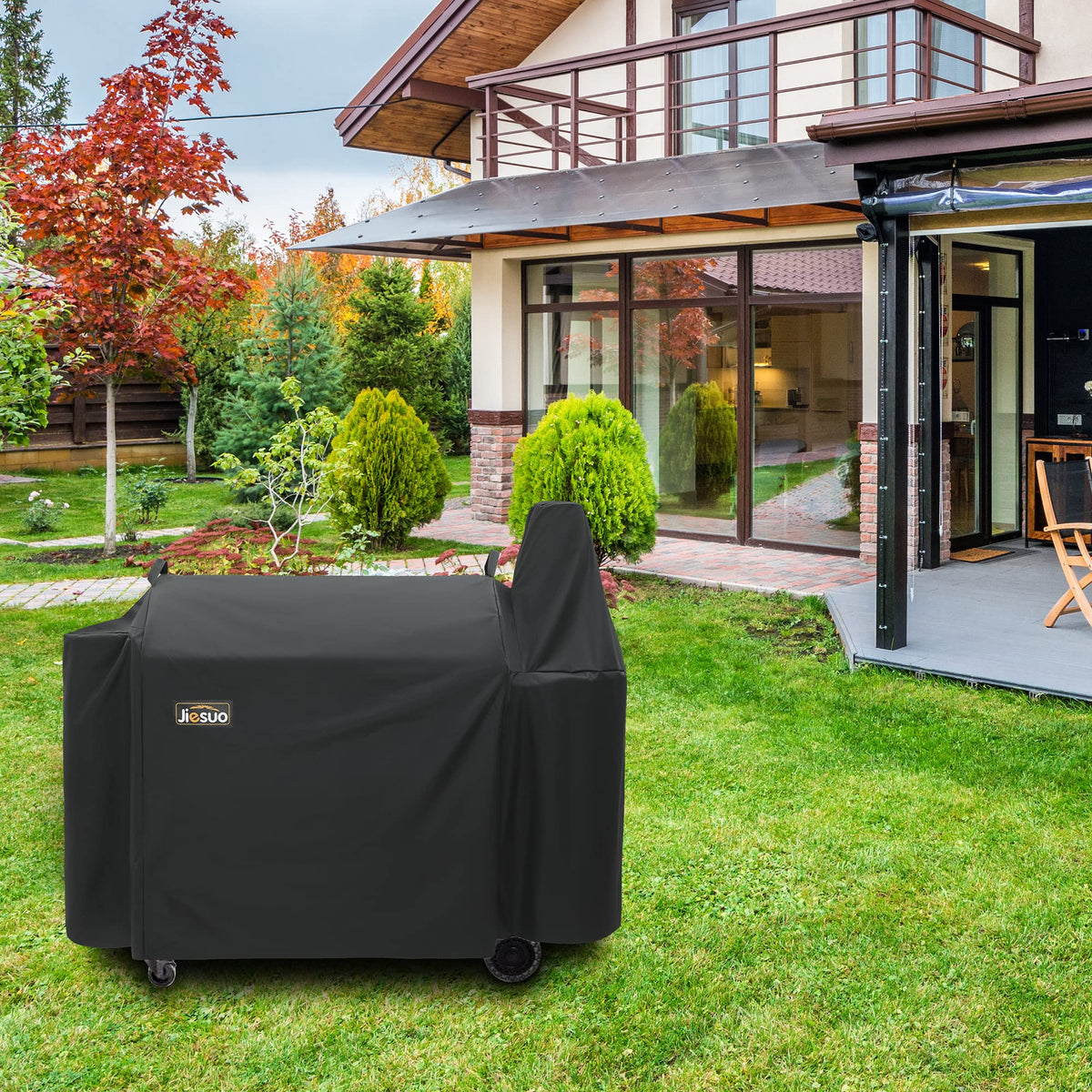 JIESUO grill cover on grill features secure Velcro straps for windy days