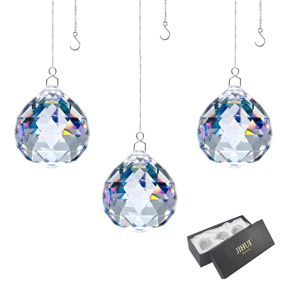 JIHUI crystal prism ball 30mm catching light to create colorful rainbows.