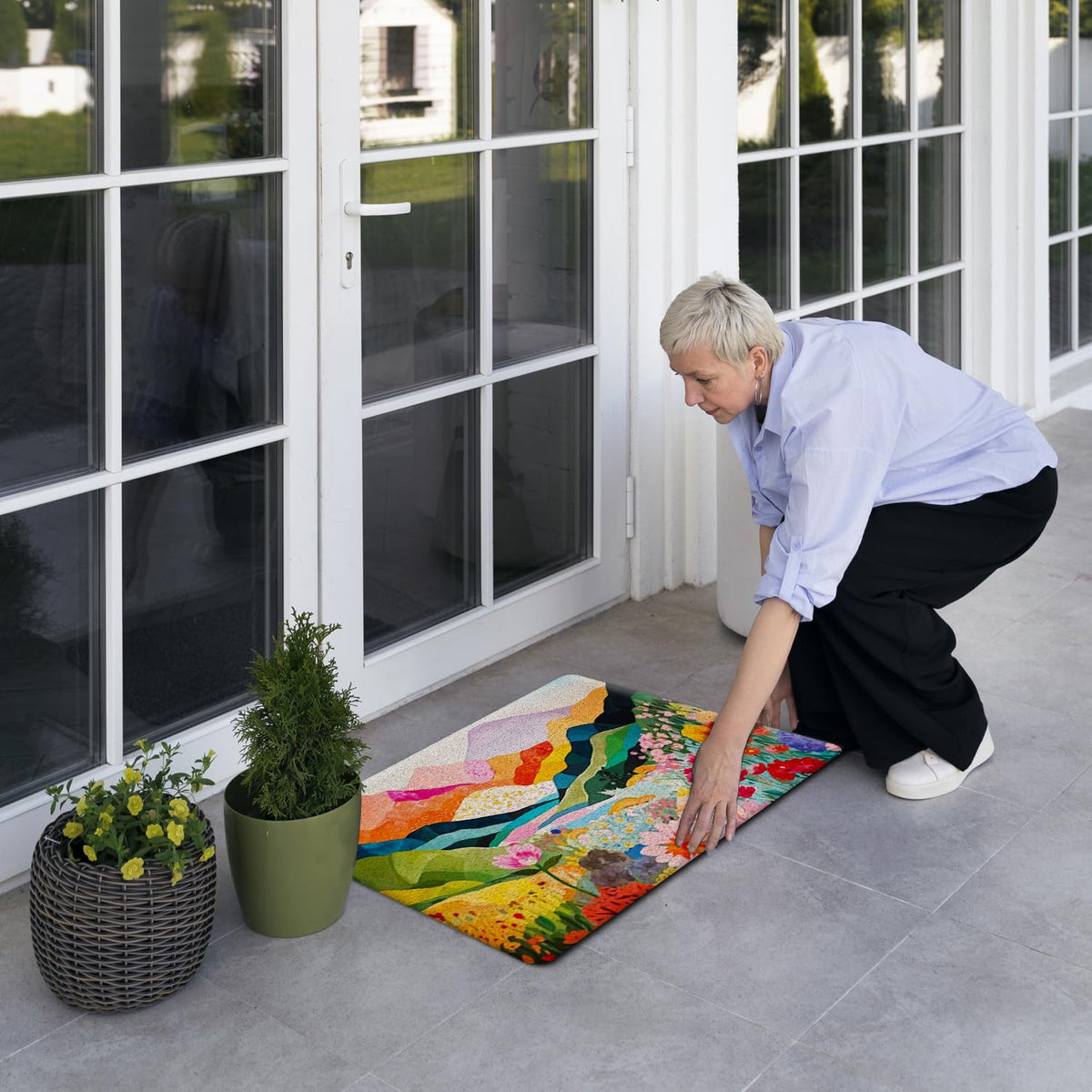 JINYO boho doormat at front door provides a stylish barrier against dirt