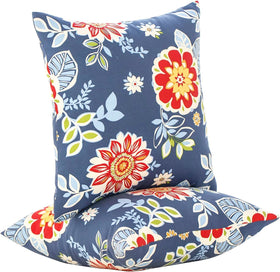 JMGBird weather-resistant outdoor pillows on a patio in red flowers against blue background, ideal for year-round decor.