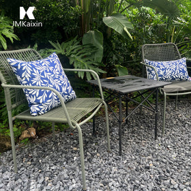 JMKaixin square pillows on a patio set for relaxation.