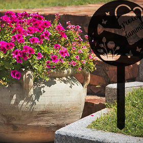 JMsuertes Grow Dammit sign in-ground stake shows easy setup for gardens