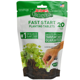 Jobes Organics Fast Start tablet feeding roots in a 6-inch pot for healthy transplants.