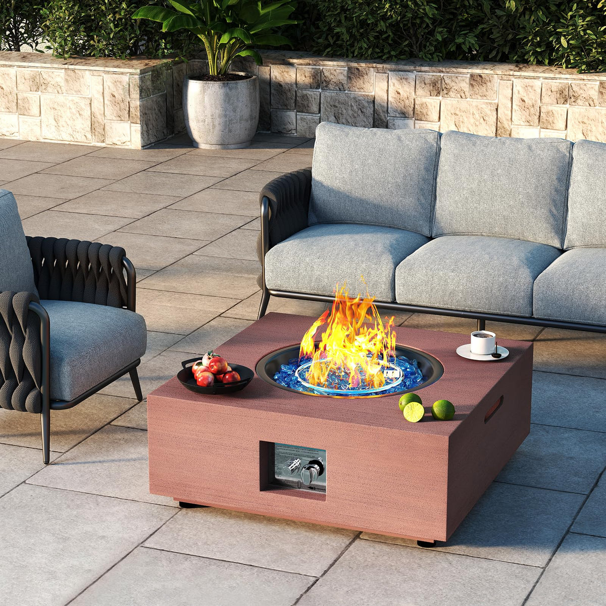 Jocoevol 28-inch fire pit table with warm flames for cozy outdoor evenings.