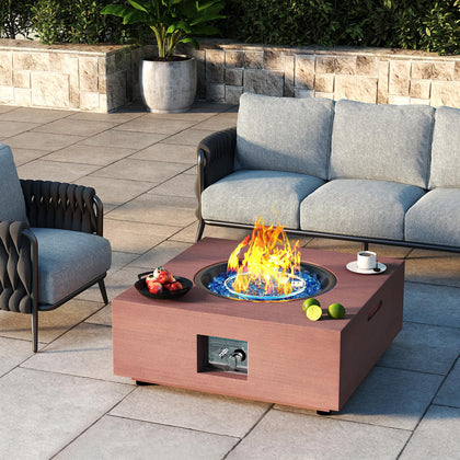Jocoevol 28-inch fire pit table with warm flames for cozy outdoor evenings.