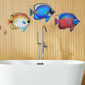 Three-piece John’s Studio fish set ideal for garden and entryway decor.