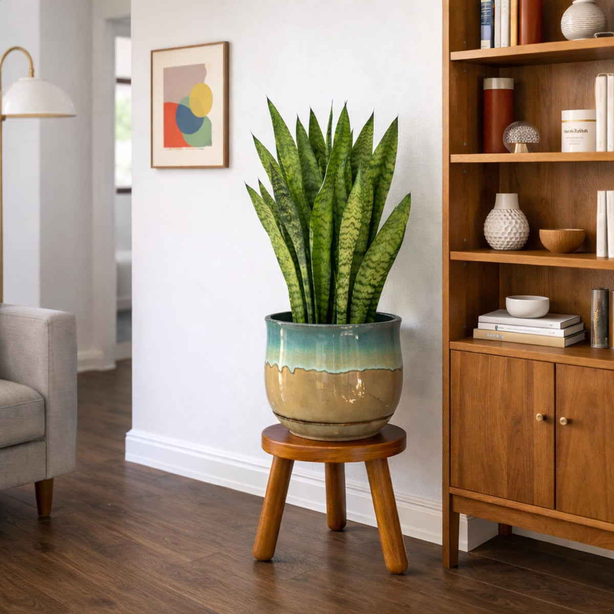 JOLLYMER teak stool showcases grain flow and character.