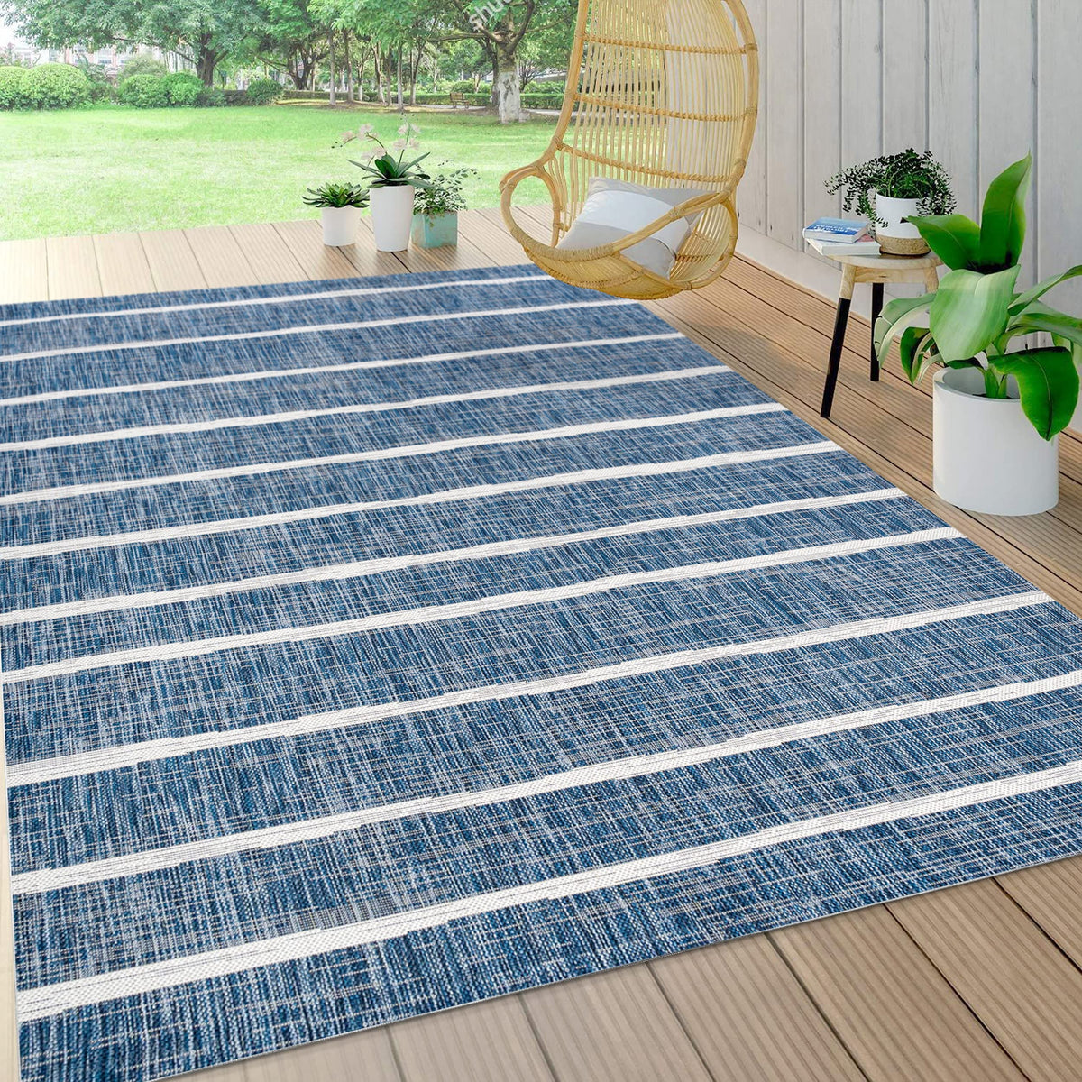 JONATHAN Y Berber Stripe rug adds coastal charm for indoor living rooms or sunlit porches.