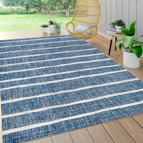 JONATHAN Y Berber Stripe rug adds coastal charm for indoor living rooms or sunlit porches.