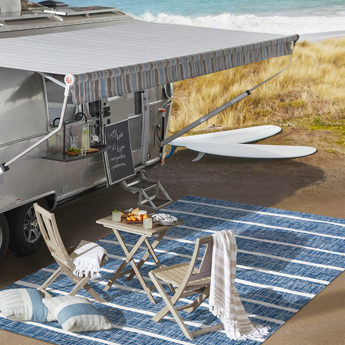 JONATHAN Y Berber Stripe rug resists fading while maintaining color in outdoor spaces.