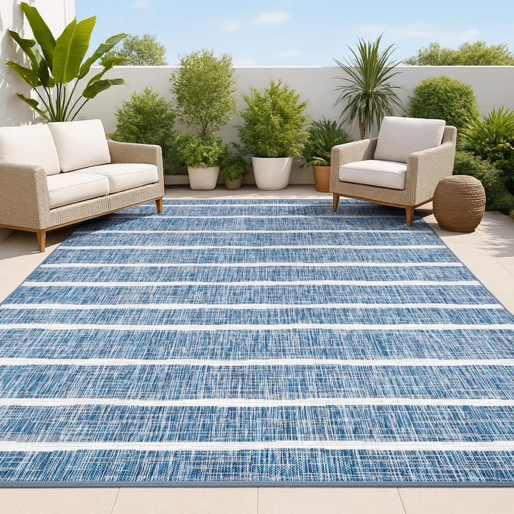 JONATHAN Y Berber Stripe indoor-outdoor rug in blue and ivory for high-traffic areas.