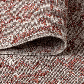 Jonathan Y red-taupe rug easy to clean and stain resistant.