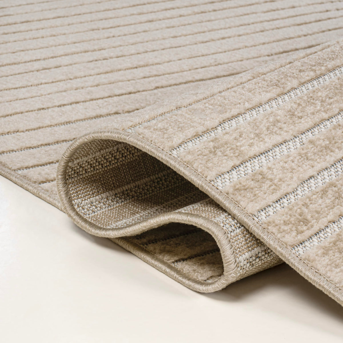 Jonathan Y Hallie living-room geometric rug adds depth without crowding space.