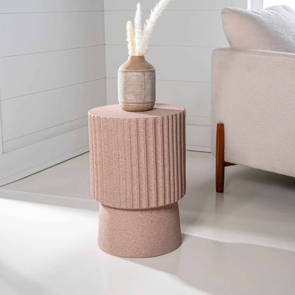JONATHAN Y Louisa tambour table compact height beside sofa.
