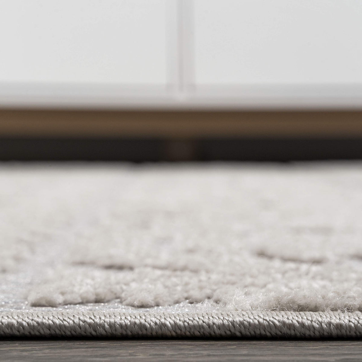 Power-loomed construction ensures the rug fibers stay put through daily use.