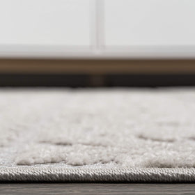 Power-loomed construction ensures the rug fibers stay put through daily use.