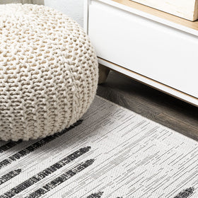 Jonathan Y Stripe Geometric Rug 5x8 in dining area, tribal-inspired flair