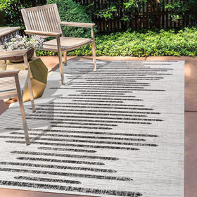 Jonathan Y Stripe Geometric Rug 5x8 in outdoor lounge, resilient for high-traffic areas