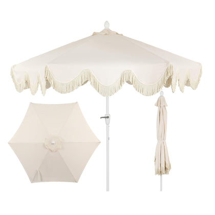 Jonathan Y umbrella cream fringe adds cottage charm while shading your seating area.