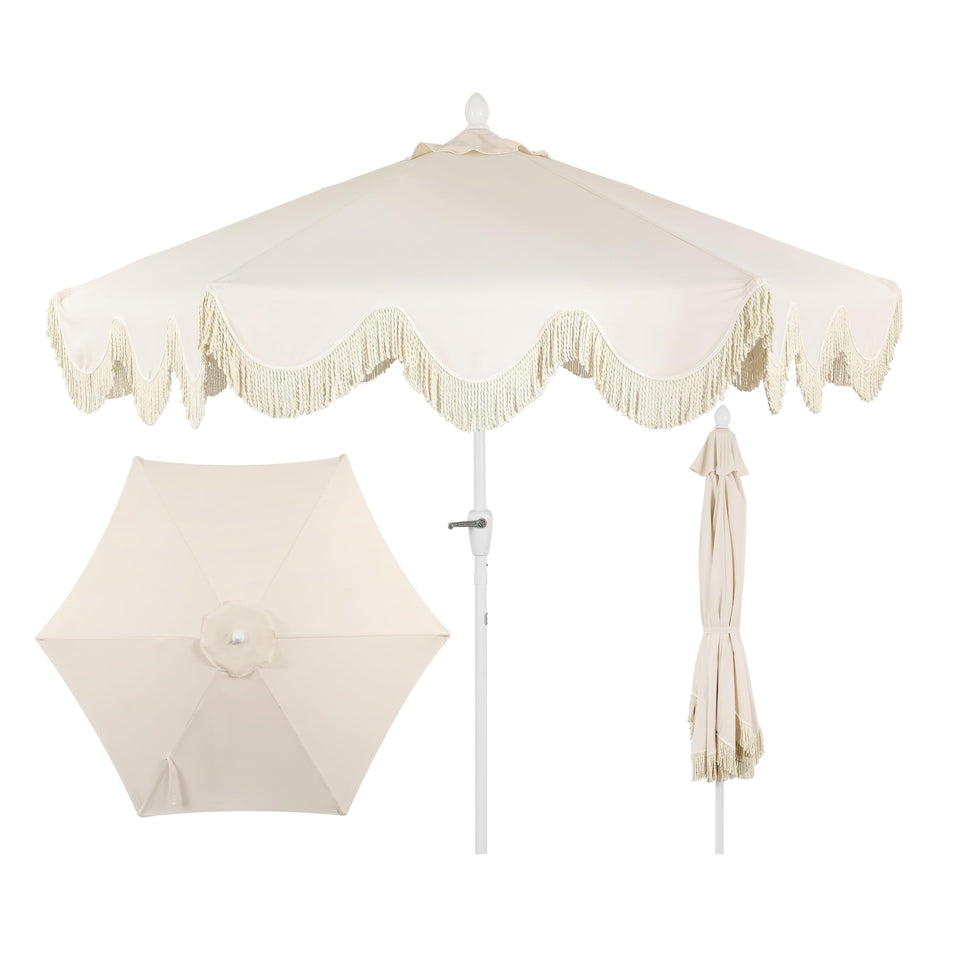 Jonathan Y umbrella cream fringe adds cottage charm while shading your seating area.