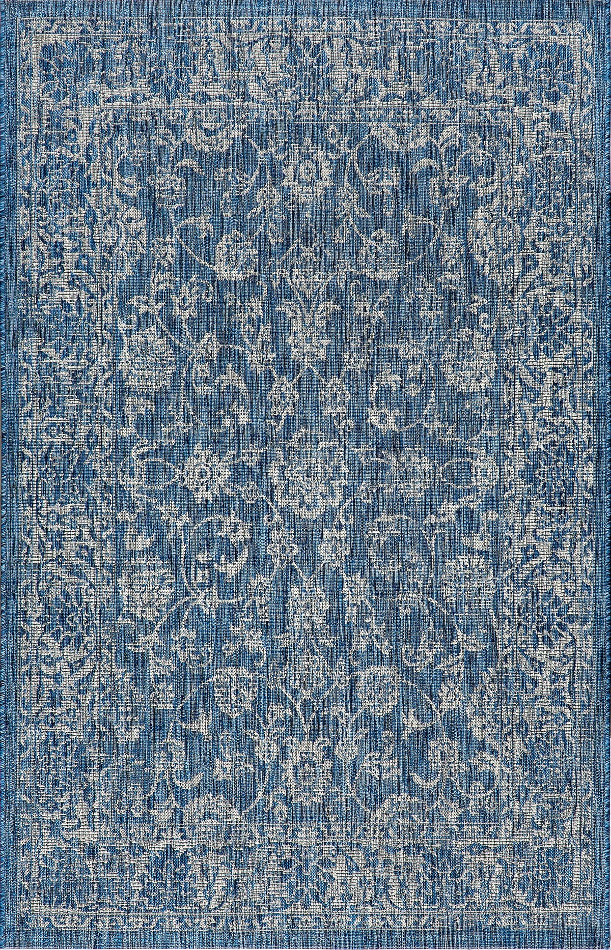 Jonathan Y Weave Floral color tones of navy and gray coordinate with outdoor furniture.