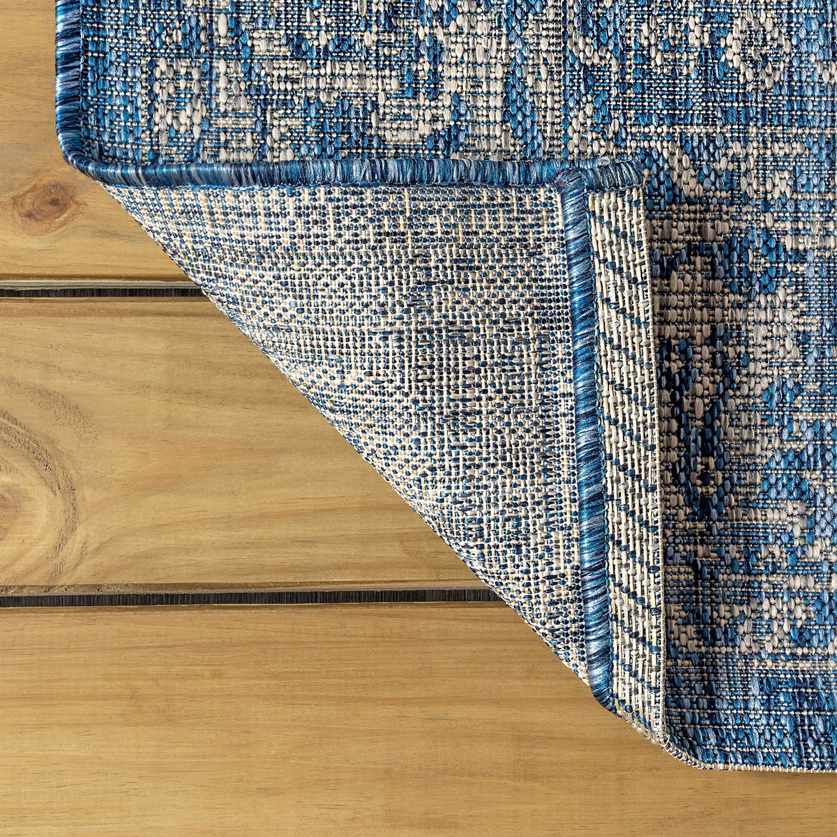 Jonathan Y Weave Floral rug for patio setup adds color and comfort to outdoor spaces.