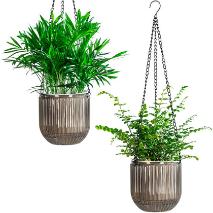 Josteve 5.2-inch self-watering planter with a clear water level indicator for easy watering.