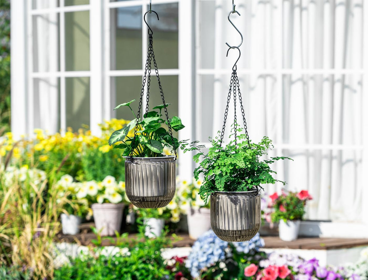 Josteve indoor-outdoor hanging/table planter for versatile placement.