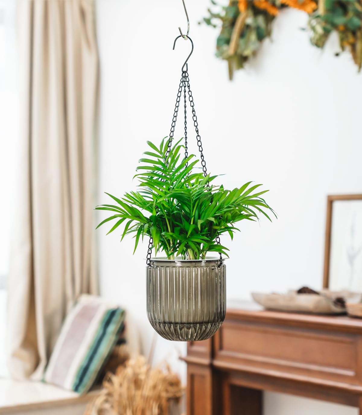 Josteve inner and outer pots show a dual-compartment water reservoir system.