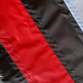 Joven flag showing reinforced wind edge and double stitching for long-lasting flyability.