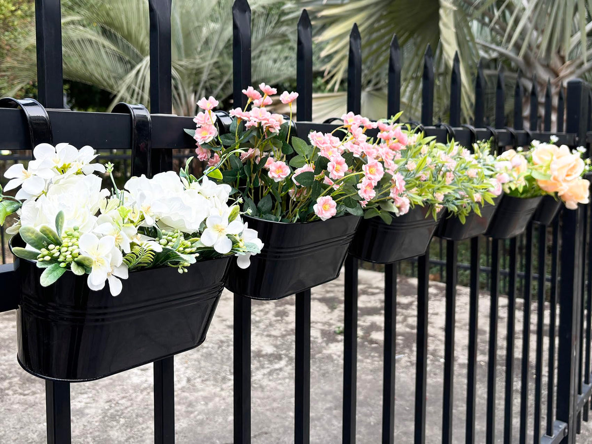 Joyfernal 12in balcony planter hanging on fence adds vertical color for blooms.