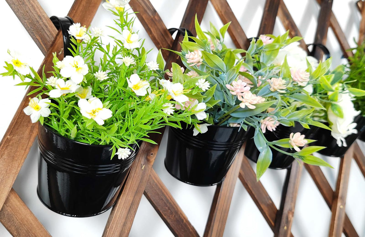 Joyfernal planters hosting herbs and succulents in a compact space.