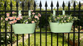 Joyfernal metal fence planter with detachable hook for easy outdoor mounting.